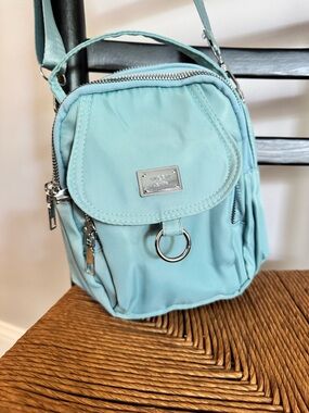 Light Aqua Crossbody Bag with Front Flap and Ring Accent